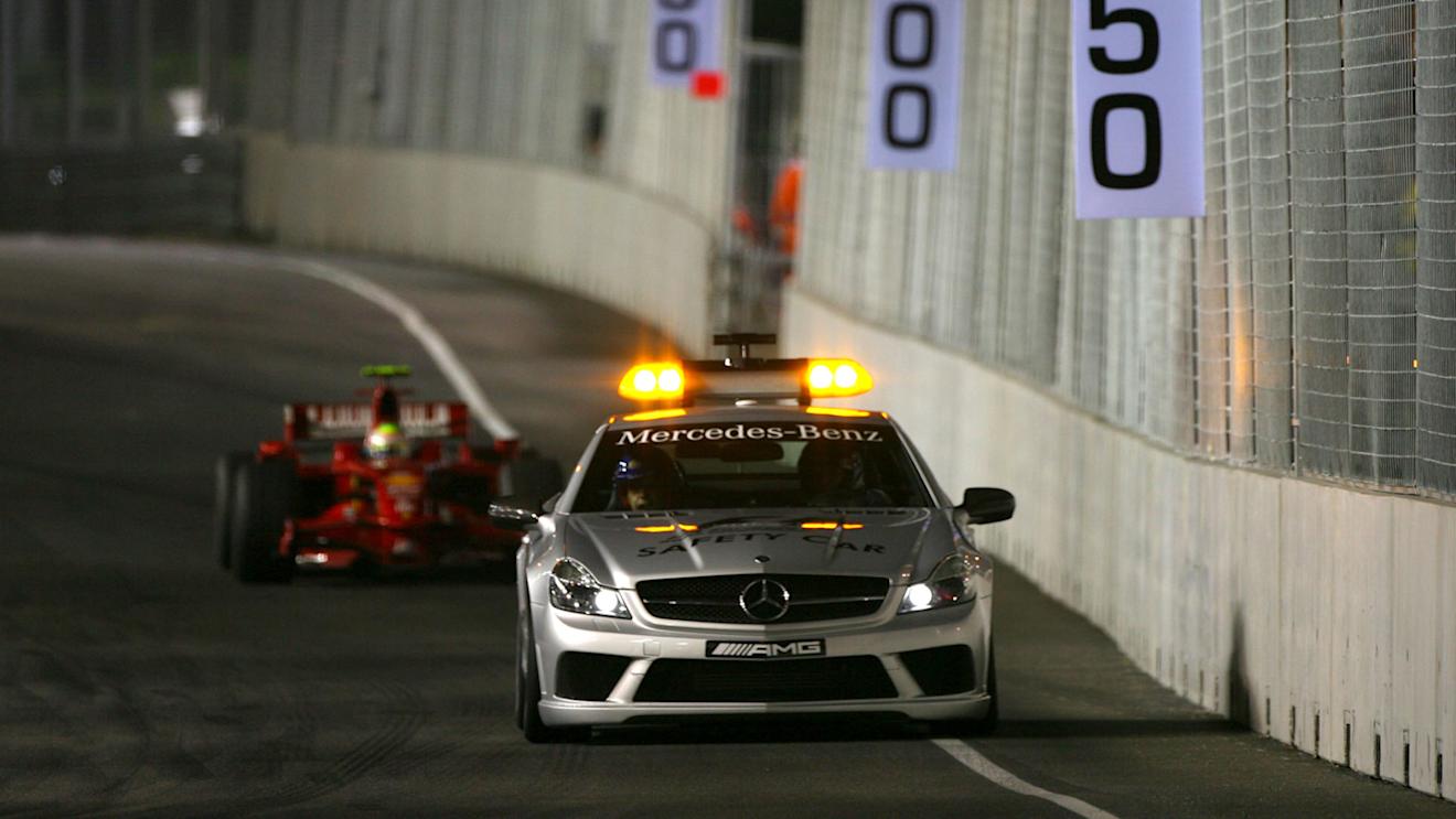 The safety car leads Felipe Massa (BRA) Ferrari F2008 
Formula One World Championship, Rd 15, Singapore Grand Prix, Race, Singapore, Sunday 28 September 2008.

BEST IMAGE © © Sutton Motorsport Images