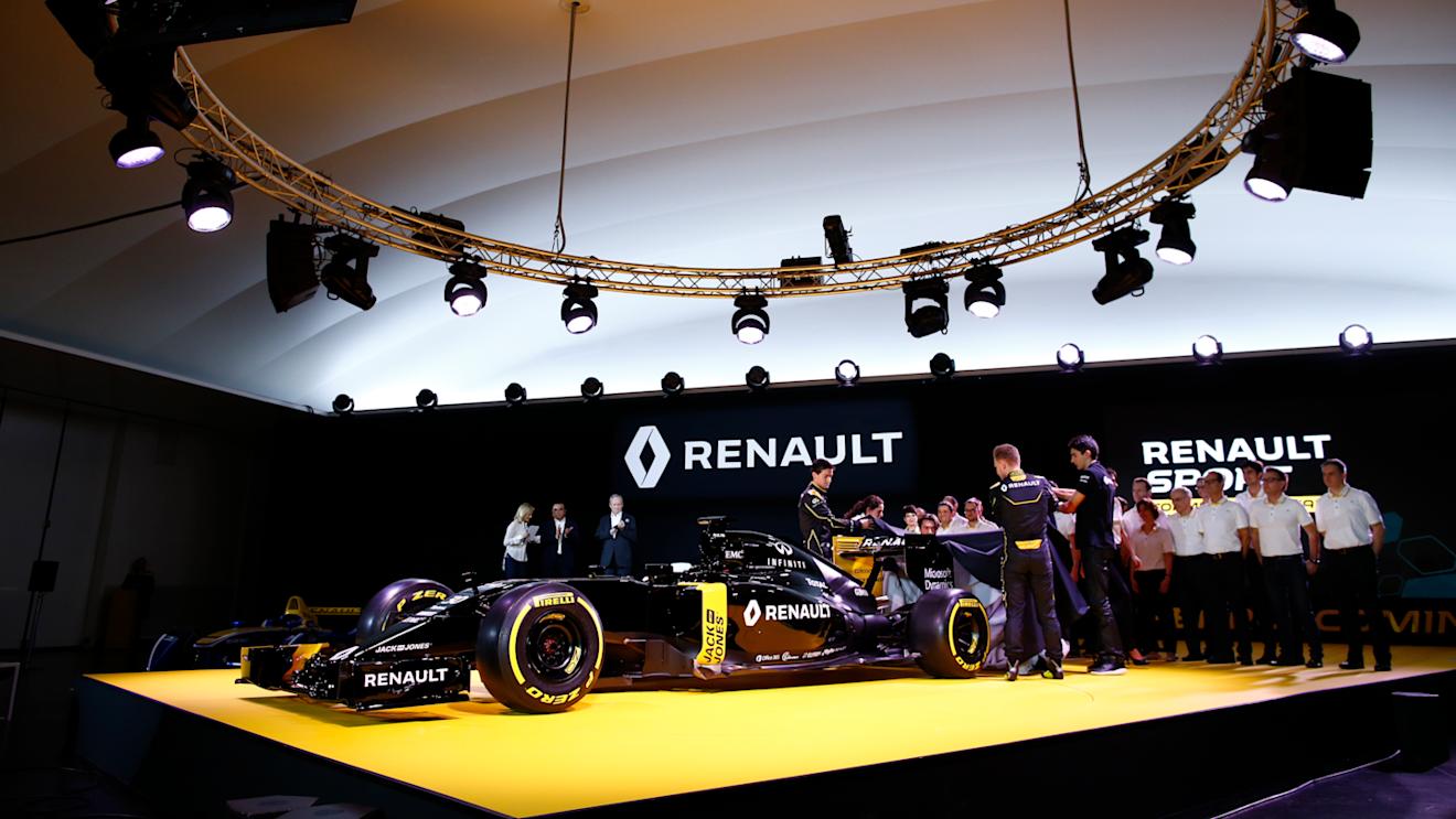 Renault F1 drivers Jolyon Palmer, Kevin Magnussen and Esteban Ocon take the covers off the new Renault R.S.16 during the Renault Sport F1 launch at Guyancourt Technocentre, France on February 3 2016. © Frederic Le Floc'h/DPPI/Renault Sport