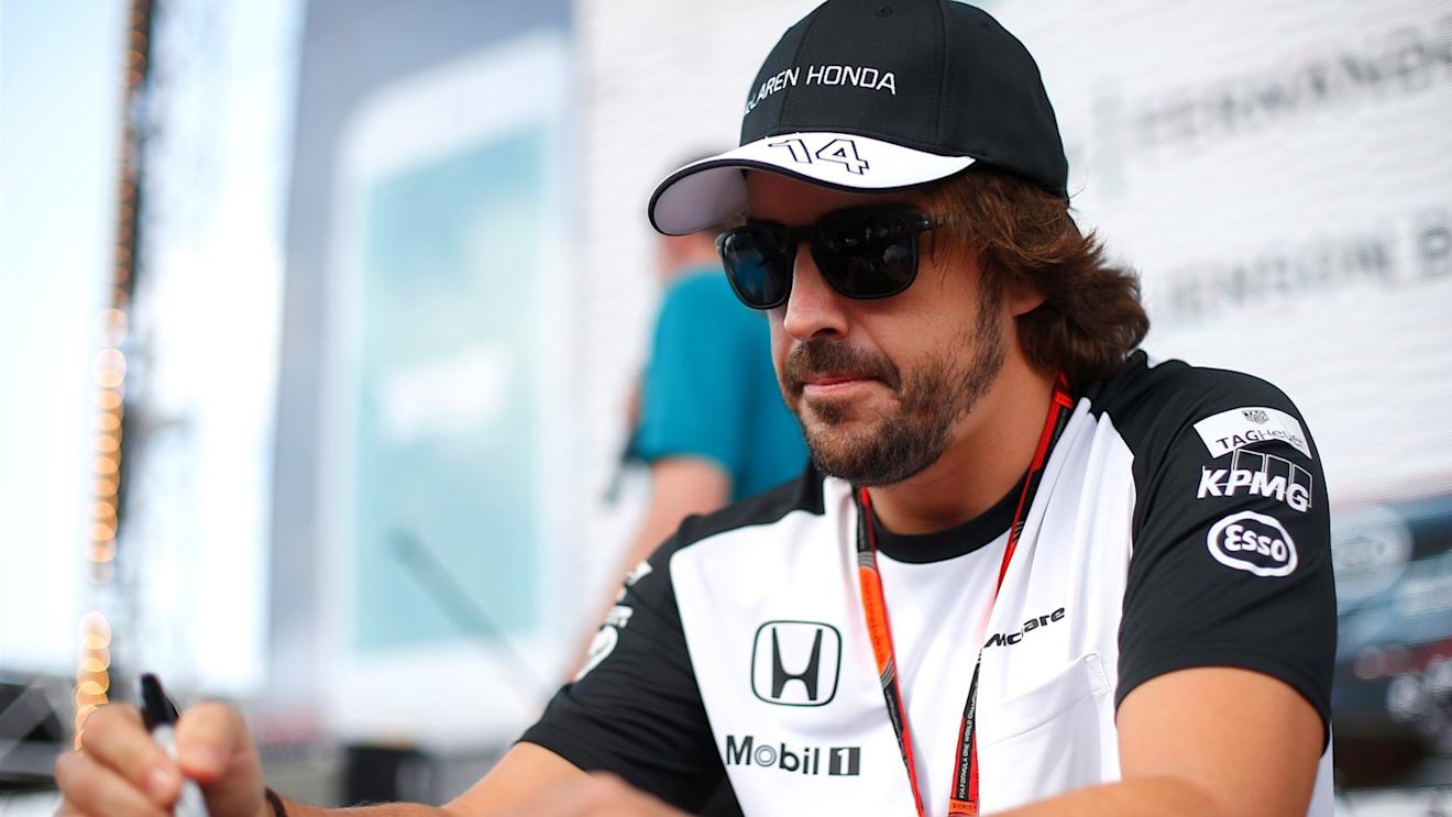 Fernando Alonso (ESP) McLaren at the autograph session at Formula One World Championship, Rd19, Abu Dhabi Grand Prix, Qualifying, Yas Marina Circuit, Abu Dhabi, UAE, Saturday 28 November 2015. © Sutton Motorsport Images