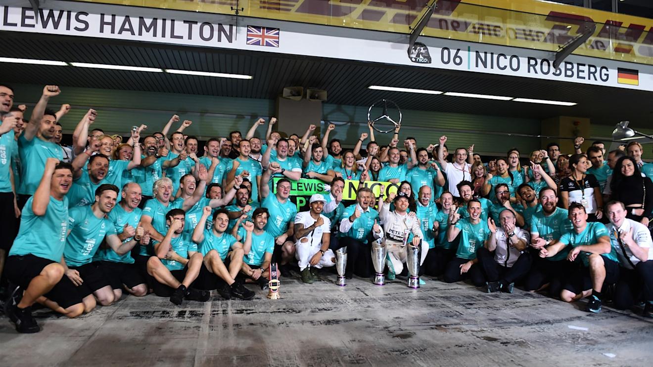 Race winner Nico Rosberg (GER) Mercedes AMG F1 celebrates with Lewis Hamilton (GBR) Mercedes AMG F1, Thomas Weber (GER) Member of the Board of Management of Daimler AG Group and the team at Formula One World Championship, Rd19, Abu Dhabi Grand Prix, Race, Yas Marina Circuit, Abu Dhabi, UAE, Sunday 29 November 2015. © Sutton Motorsport Images
