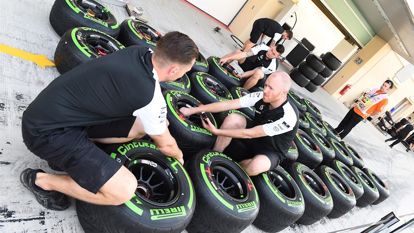 McLaren mechanics and Pirelli tyres at Formula One World Championship, Rd19, Abu Dhabi Grand Prix, Preparations, Yas Marina Circuit, Abu Dhabi, UAE, Thursday 26 November 2015. © Sutton Motorsport Images
