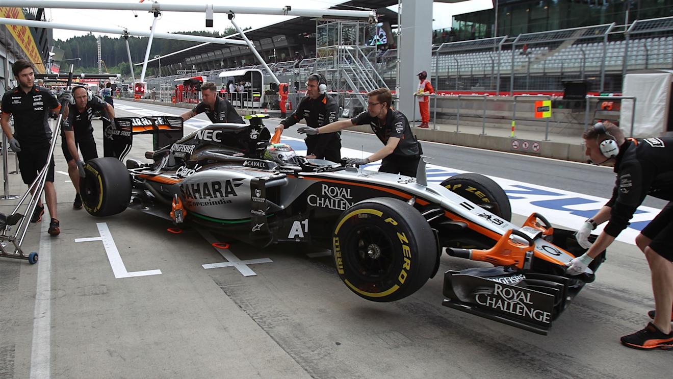 Sergio Perez (MEX) Force India VJM08 is pushed back into the garage at Formula One World Championship, Rd8, Austrian Grand Prix, Practice, Spielberg, Austria, Friday 19 June 2015. © Sutton Motorsport Images