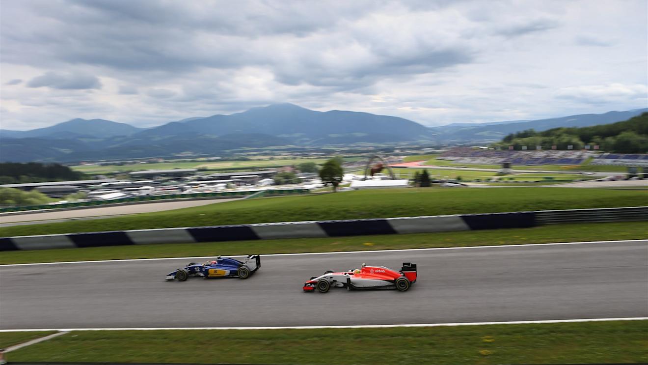 Felipe Nasr (BRA) Sauber C34 and Roberto Merhi (ESP) Manor GP at Formula One World Championship, Rd8, Austrian Grand Prix, Practice, Spielberg, Austria, Friday 19 June 2015. © Sutton Motorsport Images