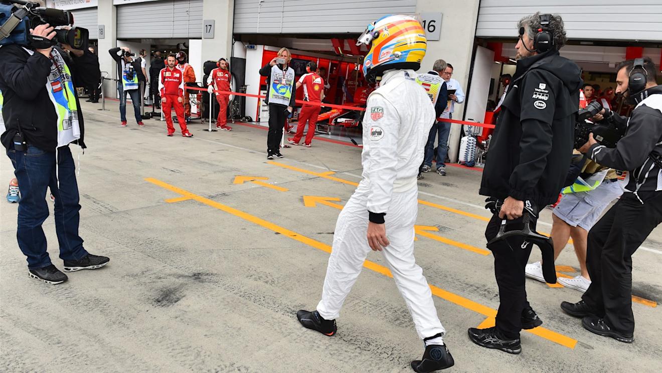 Fernando Alonso (ESP) McLaren walks in after stopping on track in FP3 at Formula One World Championship, Rd8, Austrian Grand Prix, Qualifying, Spielberg, Austria, Saturday 20 June 2015. © Sutton Motorsport Images