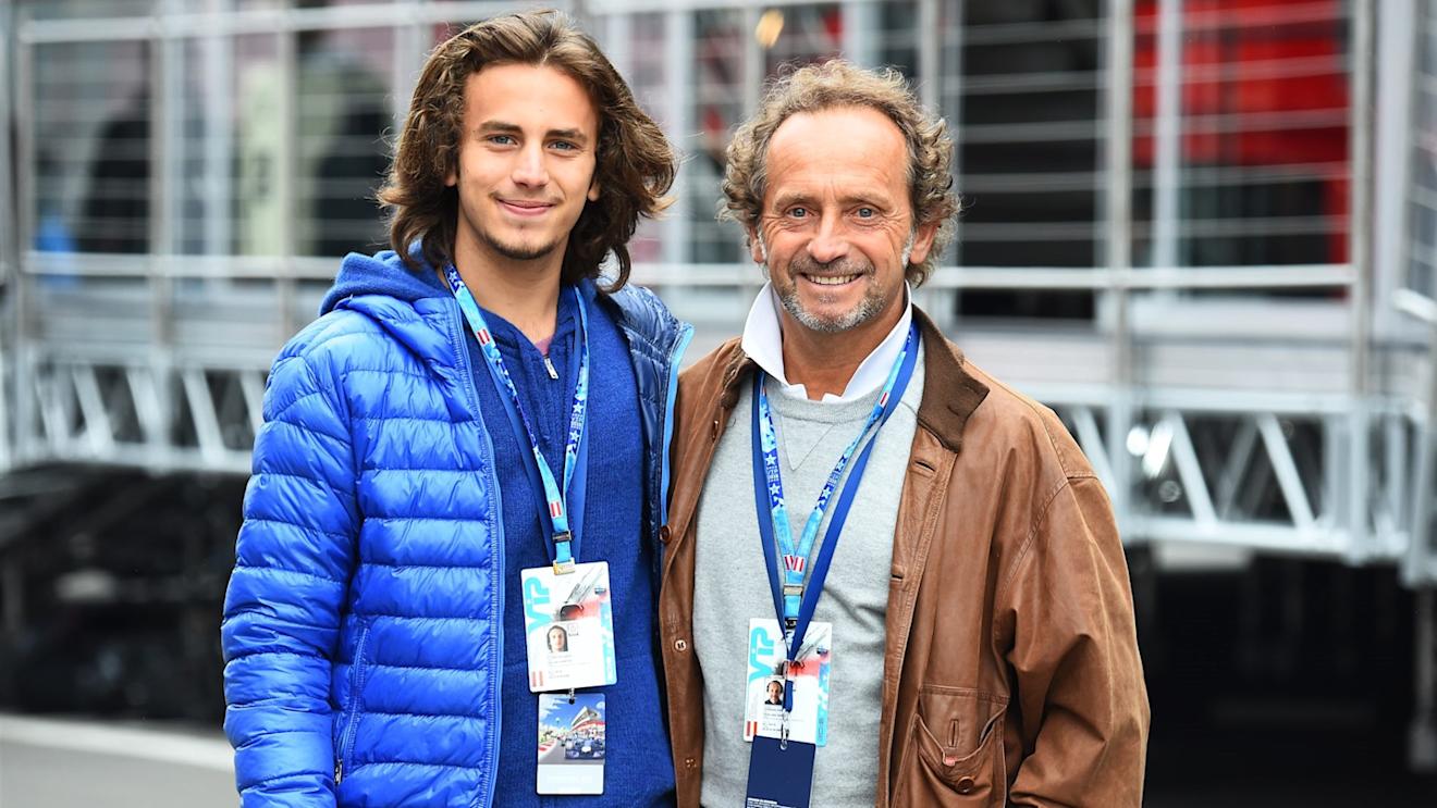 Pier Luigi Martini (ITA) Former Minardi driver in the paddock with his son at Formula One World Championship, Rd8, Austrian Grand Prix, Qualifying, Spielberg, Austria, Saturday 20 June 2015. © Sutton Motorsport Images