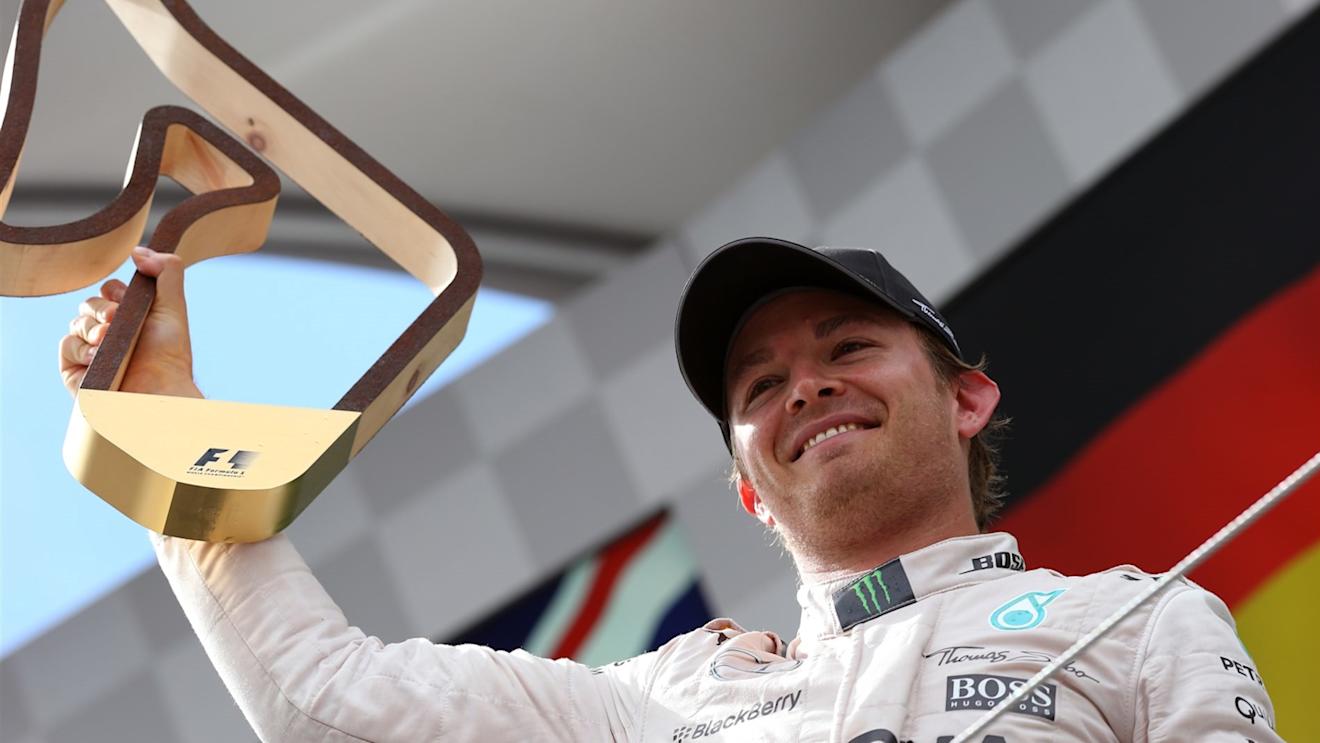 Race winner Nico Rosberg (GER) Mercedes AMG F1 celebrates with the trophy on the podium at Formula One World Championship, Rd8, Austrian Grand Prix, Race, Spielberg, Austria, Sunday 21 June 2015. © Sutton Motorsport Images
