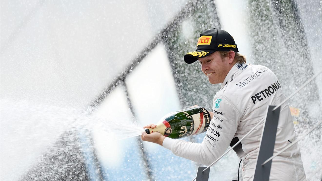Nico Rosberg (GER) Mercedes AMG F1 celebrates with champagne on the podium at Formula One World Championship, Rd8, Austrian Grand Prix, Race, Spielberg, Austria, Sunday 21 June 2015. © Sutton Motorsport Images