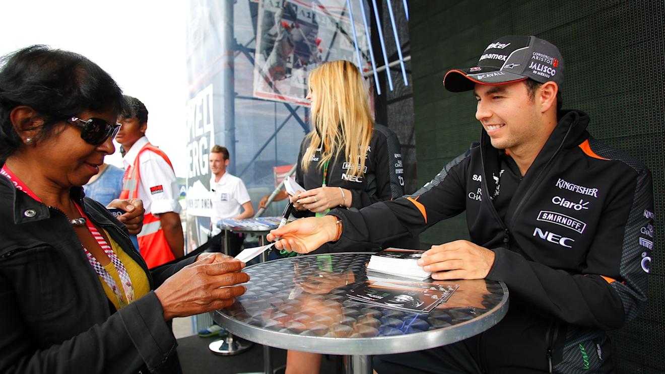 Sergio Perez (MEX) Force India signs autographs for the fans at Formula One World Championship, Rd8, Austrian Grand Prix, Preparations, Spielberg, Austria, Thursday 18 June 2015. © Sutton Motorsport Images