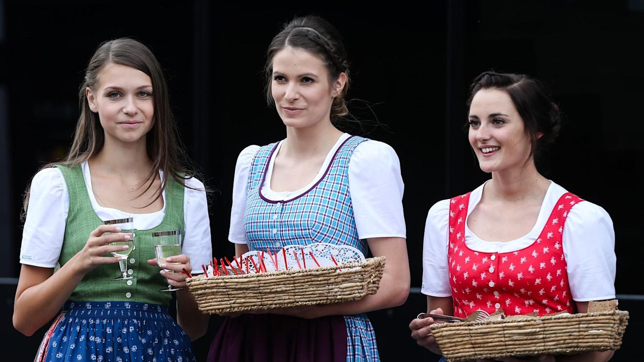 Formula Unas girls serving traditional food in the paddock at Formula One World Championship, Rd8, Austrian Grand Prix, Preparations, Spielberg, Austria, Thursday 18 June 2015. © Sutton Motorsport Images