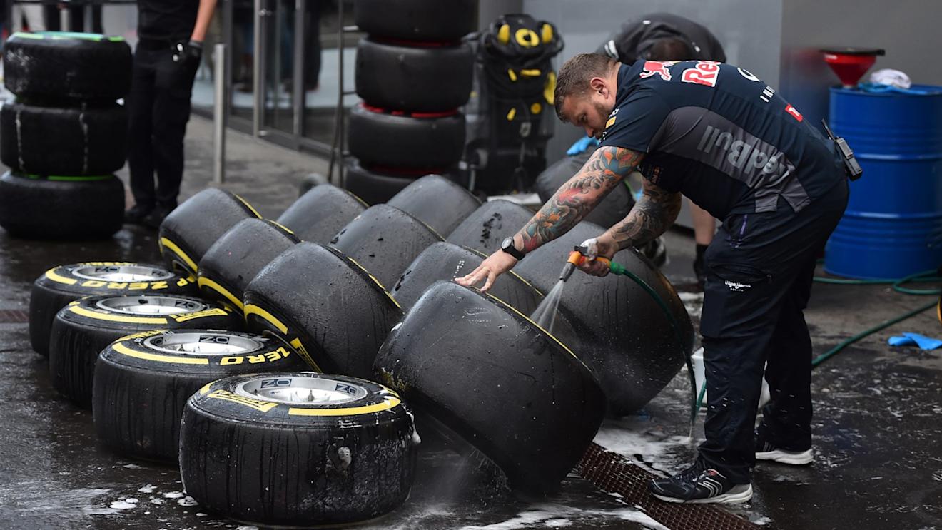 Red Bull Racing mechanic washes Pirelli tyres and wheels at Formula One Testing, Day One, Spielberg, Austria, Tuesday 23 June 2015. © Sutton Motorsport Images