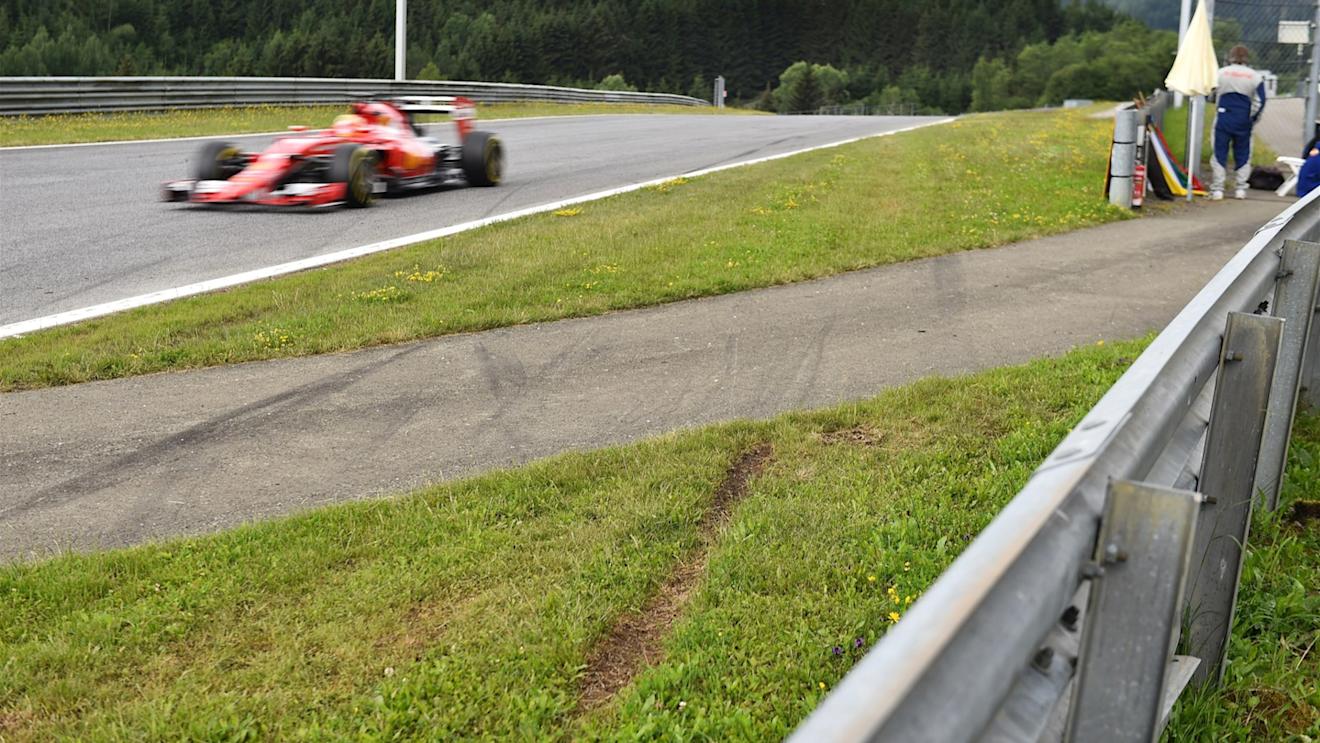 Esteban Gutierrez (MEX) Ferrari Test and Reserve Driver drives past the incident area with tyre marks in the grass from last weeks Austrian Grand Prix race at Formula One Testing, Day Two, Spielberg, Austria, Wednesday 24 June 2015. © Sutton Motorsport Images
