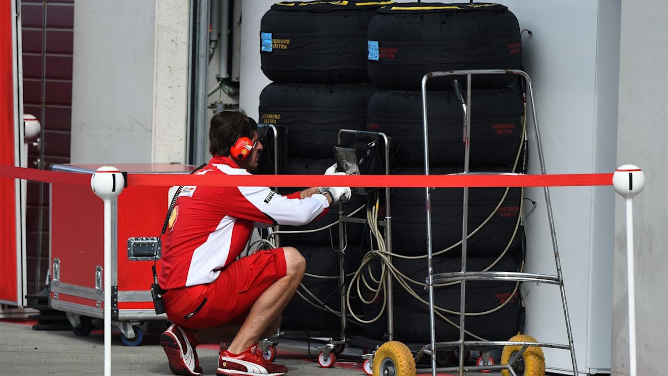 Ferrari mechanic with Pirelli tyres at Formula One Testing, Day Two, Spielberg, Austria, Wednesday 24 June 2015. © Sutton Motorsport Images