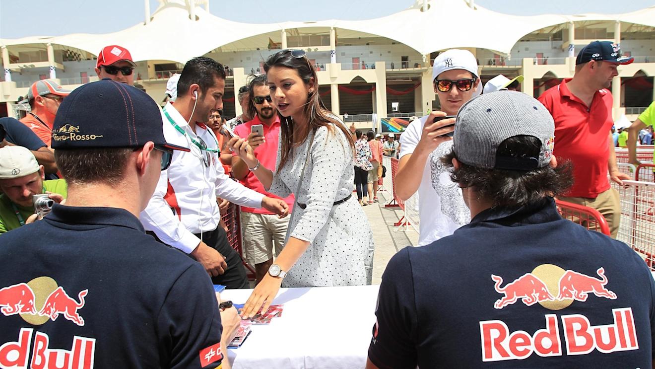 Max Verstappen (NDL) Scuderia Toro Rosso and Carlos Sainz jr (ESP) Scuderia Toro Rosso sign autographs for the fans at Formula One World Championship, Rd4, Bahrain Grand Prix Qualifying, Bahrain International Circuit, Sakhir, Bahrain, Saturday 18  April 2015. © Sutton Motorsport Images