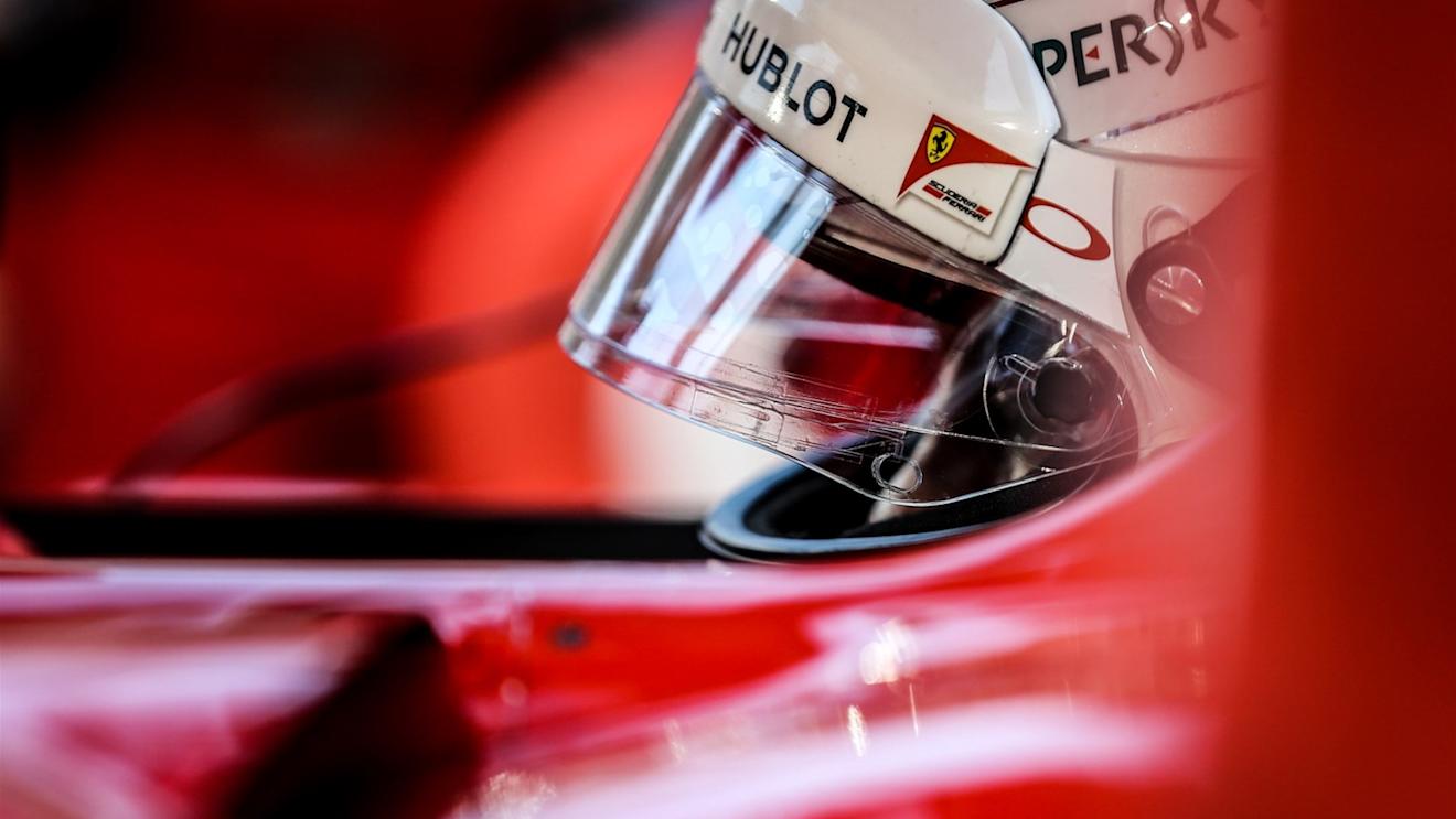 Sebastian Vettel (GER) Ferrari SF15-T on the grid at Formula One World Championship, Rd4, Bahrain Grand Prix Race, Bahrain International Circuit, Sakhir, Bahrain, Sunday 19  April 2015. © Sutton Motorsport Images