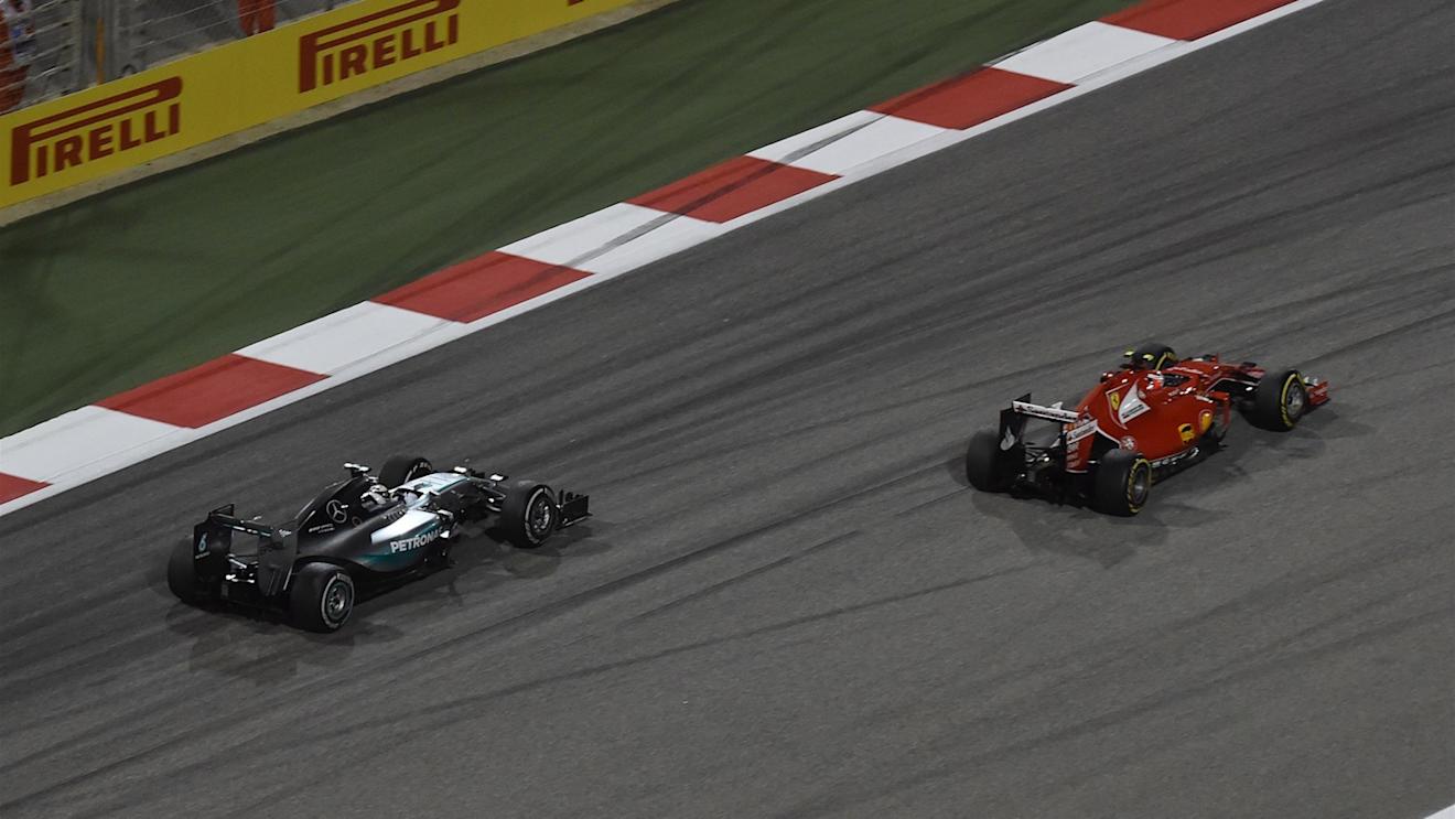 Lewis Hamilton (GBR) Mercedes AMG F1 W06 and Kimi Raikkonen (FIN) Ferrari SF15-T at Formula One World Championship, Rd4, Bahrain Grand Prix Race, Bahrain International Circuit, Sakhir, Bahrain, Sunday 19  April 2015. © Sutton Motorsport Images