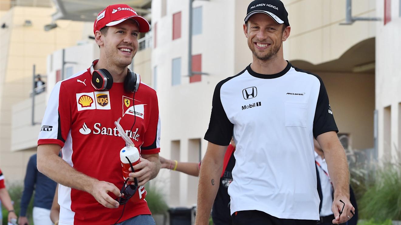 Sebastian Vettel (GER) Ferrari and Jenson Button (GBR) McLaren at Formula One World Championship, Rd4, Bahrain Grand Prix Race, Bahrain International Circuit, Sakhir, Bahrain, Sunday 19  April 2015. © Sutton Motorsport Images