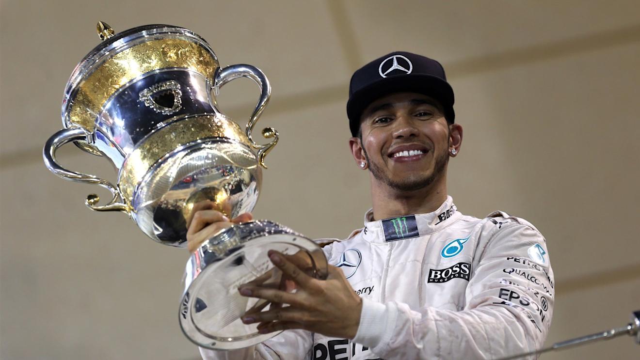 Race winner Lewis Hamilton (GBR) Mercedes AMG F1 celebrates on the podium with the trophy at Formula One World Championship, Rd4, Bahrain Grand Prix Race, Bahrain International Circuit, Sakhir, Bahrain, Sunday 19  April 2015. © Sutton Motorsport Images