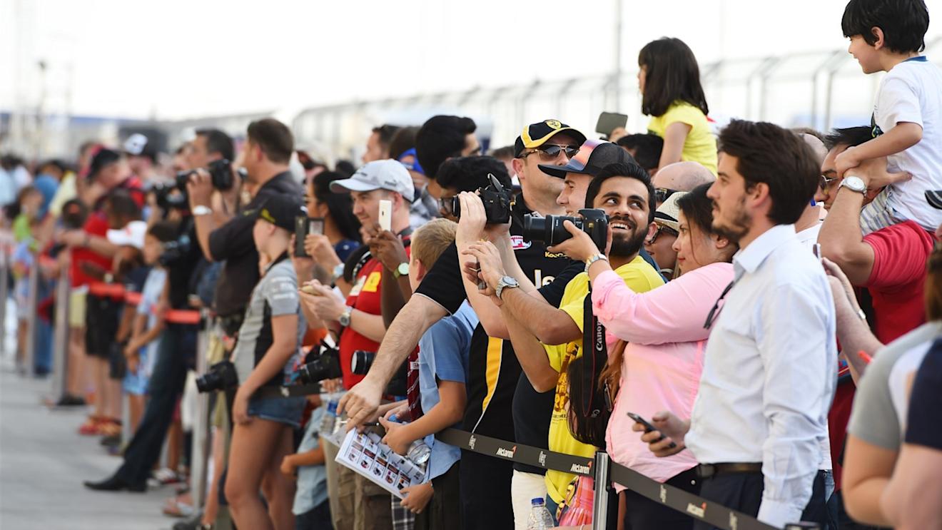 Fans on the pitlane walk at Formula One World Championship, Rd4, Bahrain Grand Prix Preparations, Bahrain International Circuit, Sakhir, Bahrain, Thursday 16  April 2015. © Sutton Motorsport Images