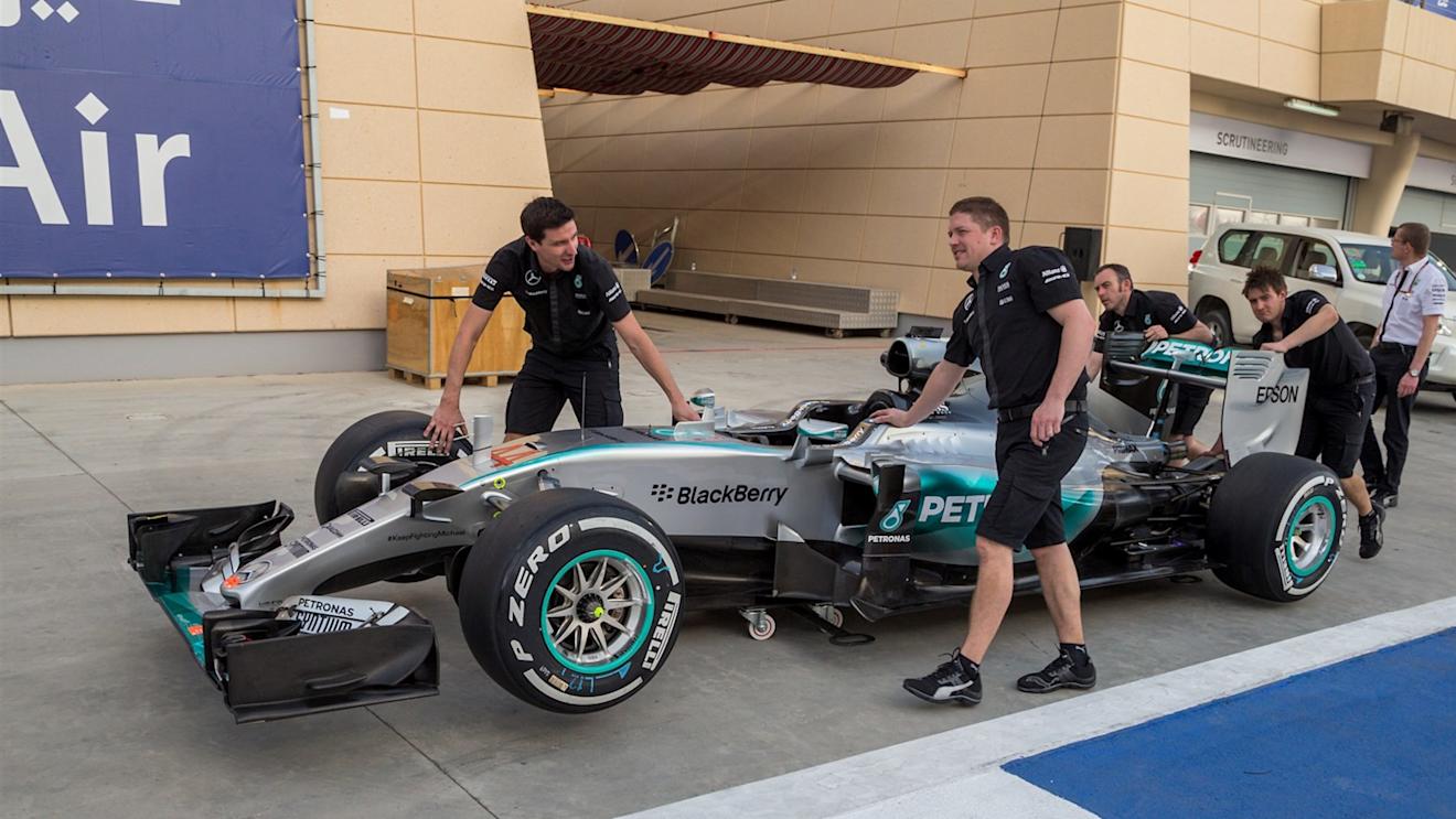 Mercedes AMG F1 mechanics with Mercedes AMG F1 W06 at Formula One World Championship, Rd4, Bahrain Grand Prix Preparations, Bahrain International Circuit, Sakhir, Bahrain, Thursday 16  April 2015. © Sutton Motorsport Images