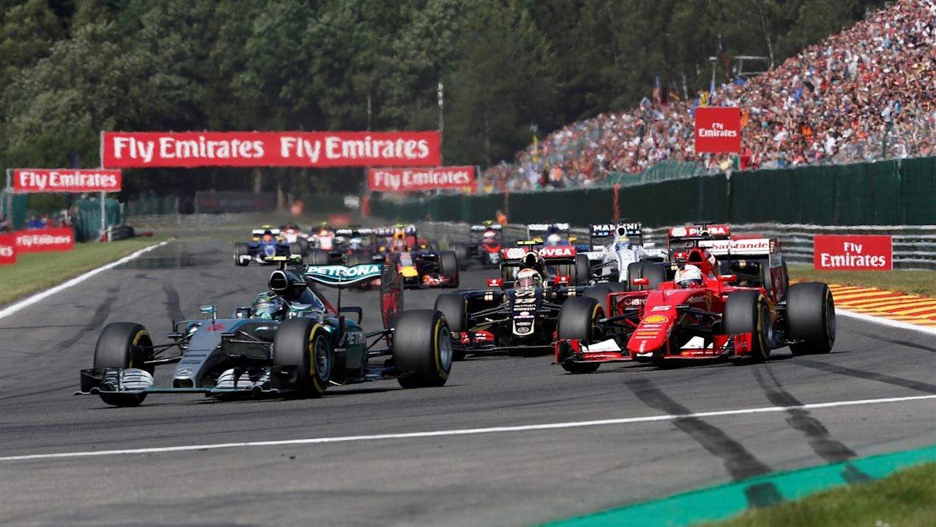 Nico Rosberg (GER) Mercedes AMG F1 W06 and Sebastian Vettel (GER) Ferrari SF15-T at the start of the race at Formula One World Championship, Rd11, Belgian Grand Prix, Race, Spa Francorchamps, Belgium, Sunday 23 August 2015. © Sutton Motorsport Images