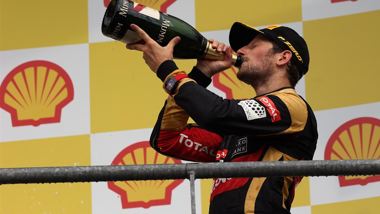 Romain Grosjean (FRA) Lotus F1 celebrates with the champagne on the podium at Formula One World Championship, Rd11, Belgian Grand Prix, Race, Spa Francorchamps, Belgium, Sunday 23 August 2015. © Sutton Motorsport Images