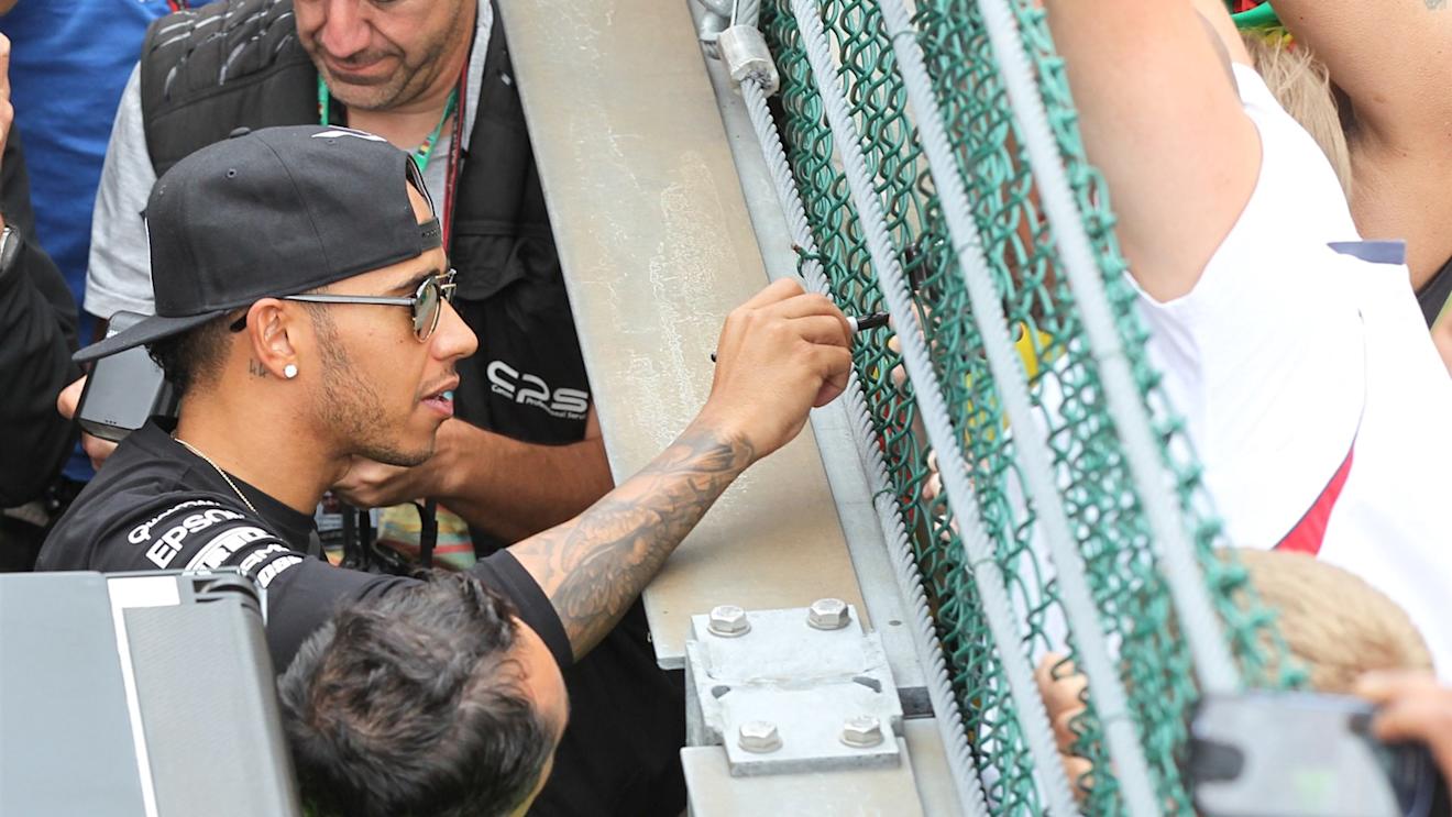 Lewis Hamilton (GBR) Mercedes AMG F1 signs autographs for fans at Formula One World Championship, Rd11, Belgian Grand Prix, Race, Spa Francorchamps, Belgium, Sunday 23 August 2015. © Sutton Motorsport Images