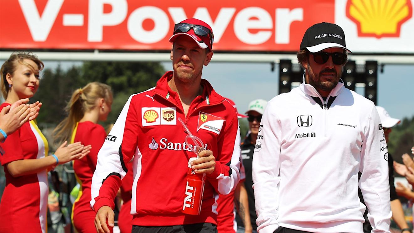 Sebastian Vettel (GER) Ferrari and Fernando Alonso (ESP) McLaren at the drivers parade at Formula One World Championship, Rd11, Belgian Grand Prix, Race, Spa Francorchamps, Belgium, Sunday 23 August 2015. © Sutton Motorsport Images