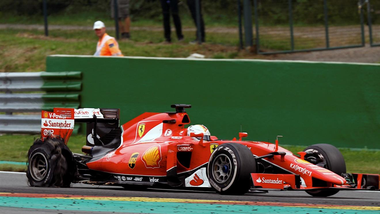 Sebastian Vettel (GER) Ferrari SF15-T with rear puncture at Formula One World Championship, Rd11, Belgian Grand Prix, Race, Spa Francorchamps, Belgium, Sunday 23 August 2015. © Sutton Motorsport Images