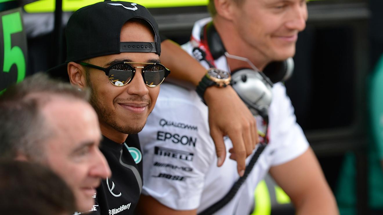 Race winner Lewis Hamilton (GBR) Mercedes AMG F1 celebrates with the teamat Formula One World Championship, Rd10, Hungarian Grand Prix, Race, Hungaroring, Hungary, Sunday 26 July 2015. © Sutton Motorsport Images