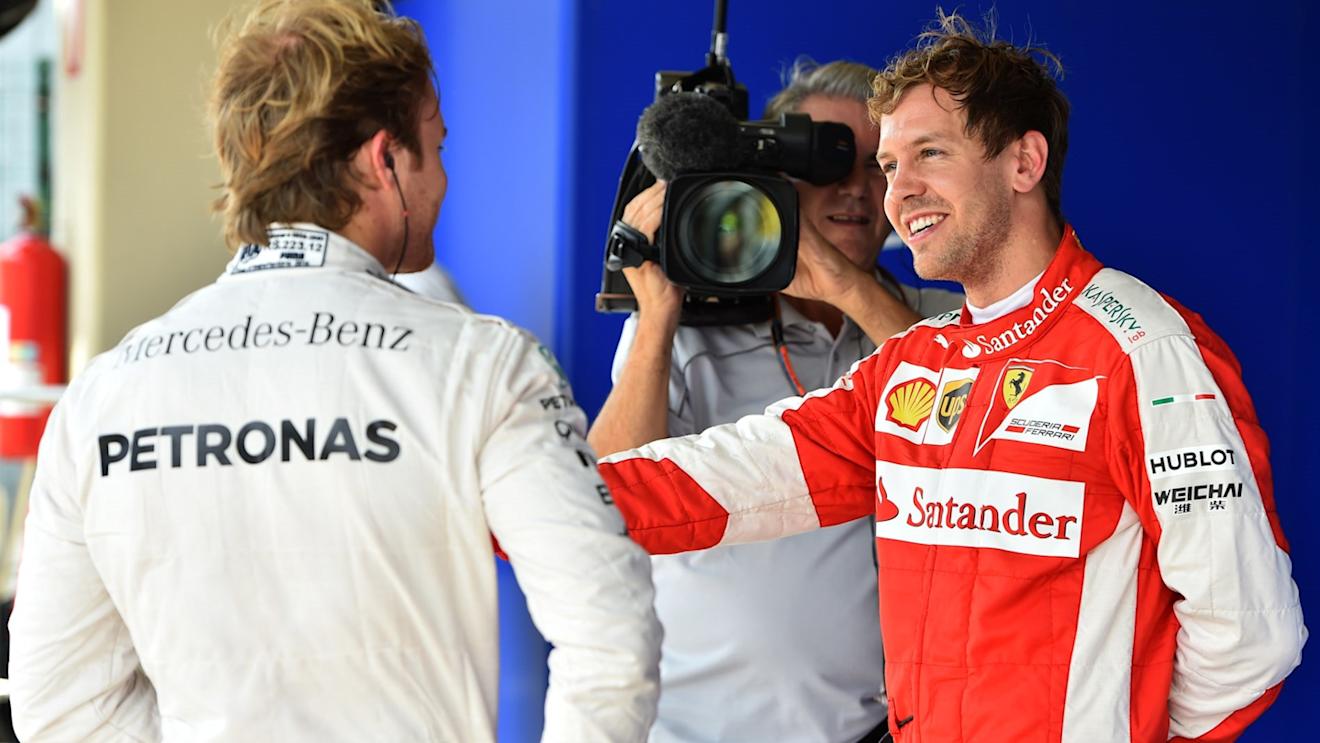 Pole sitter Nico Rosberg (GER) Mercedes AMG F1 and Sebastian Vettel (GER) Ferrari celebrate in parc ferme at Formula One World Championship, Rd18, Brazilian Grand Prix, Qualifying, Interlagos, Sao Paulo, Brazil, Saturday 14 November 2015. © Sutton Motorsport Images