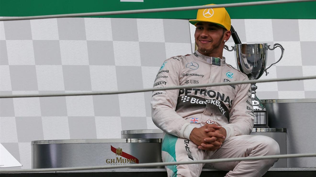 Lewis Hamilton (GBR) Mercedes AMG F1 celebrates on the podium at Formula One World Championship, Rd18, Brazilian Grand Prix, Race, Interlagos, Sao Paulo, Brazil, Sunday 15 November 2015. © Sutton Motorsport Images