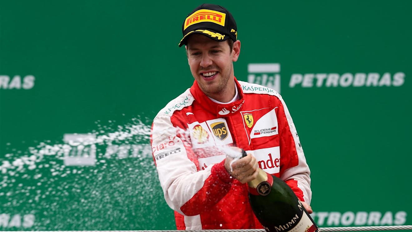 Sebastian Vettel (GER) Ferrari celebrates with the champagne on the podium at Formula One World Championship, Rd18, Brazilian Grand Prix, Race, Interlagos, Sao Paulo, Brazil, Sunday 15 November 2015. © Sutton Motorsport Images