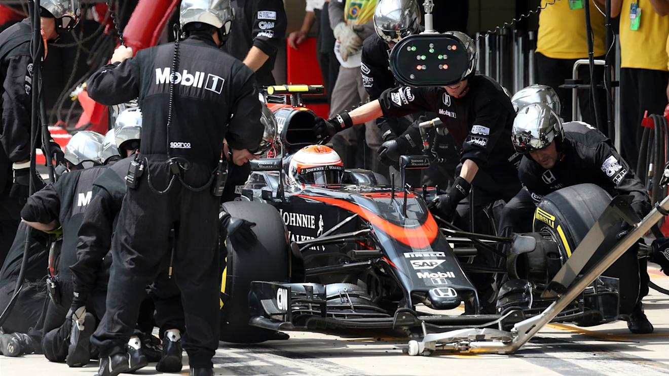 Jenson Button (GBR) McLaren MP4-30 pit stop at Formula One World Championship, Rd18, Brazilian Grand Prix, Race, Interlagos, Sao Paulo, Brazil, Sunday 15 November 2015. © Sutton Motorsport Images