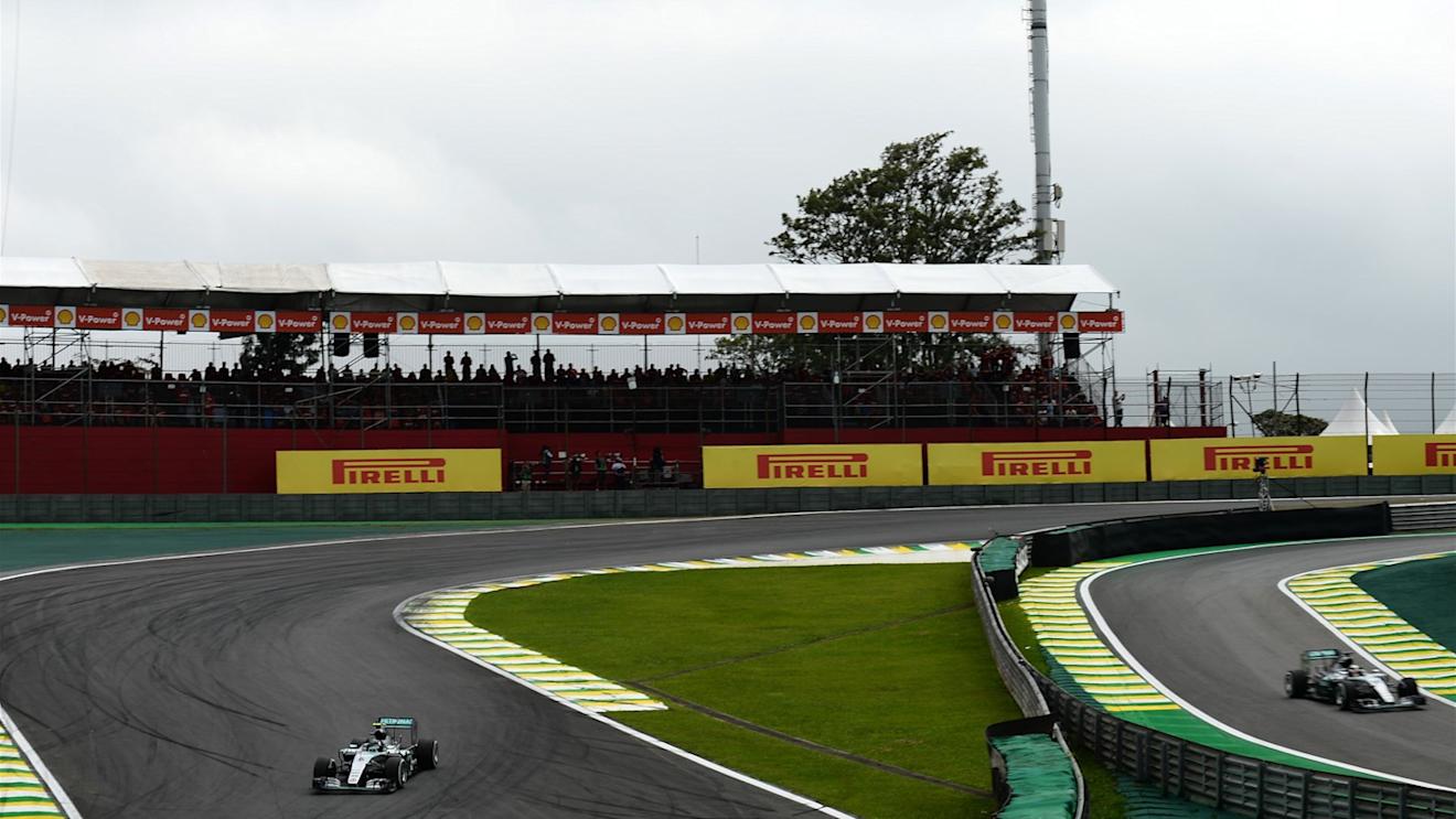 Nico Rosberg (GER) Mercedes AMG F1 W06 on track as Lewis Hamilton (GBR) Mercedes AMG F1 W06 exits pit lane at Formula One World Championship, Rd18, Brazilian Grand Prix, Race, Interlagos, Sao Paulo, Brazil, Sunday 15 November 2015. © Sutton Motorsport Images