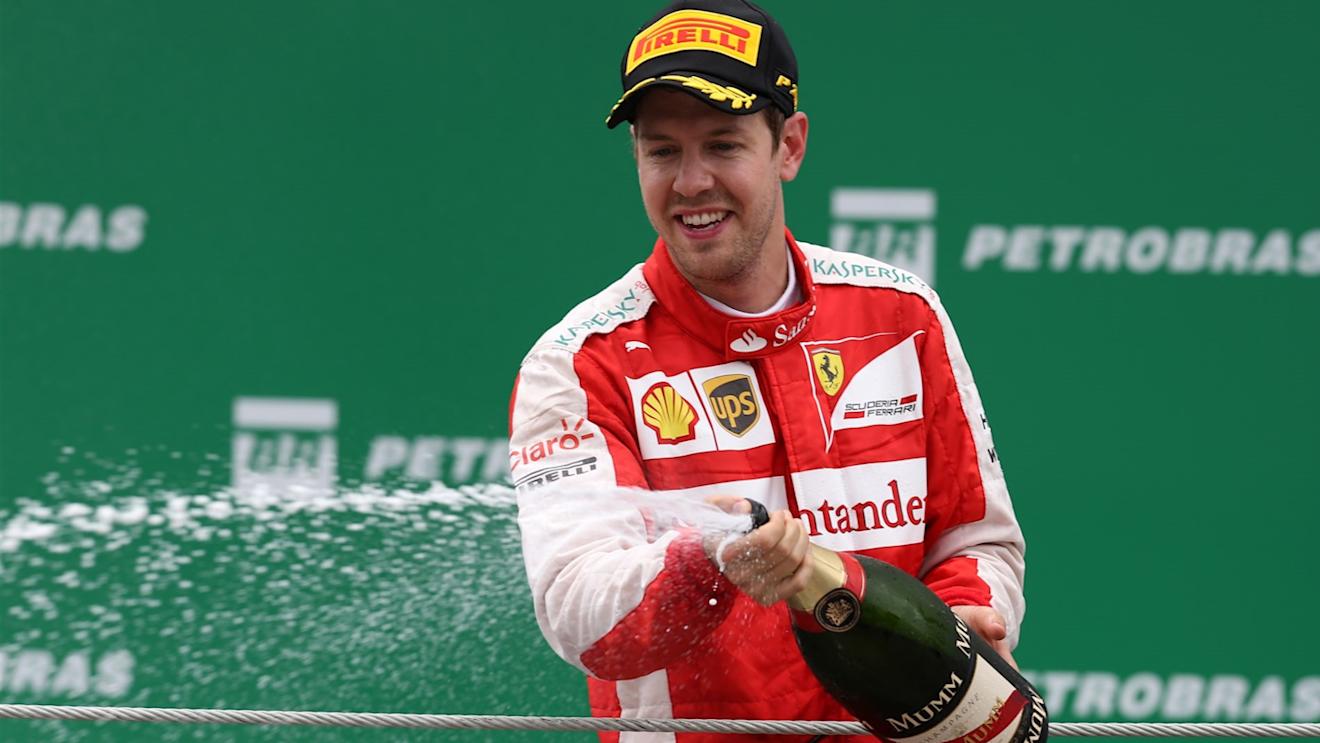 Sebastian Vettel (GER) Ferrari celebrates on the podium with the champagne at Formula One World Championship, Rd18, Brazilian Grand Prix, Race, Interlagos, Sao Paulo, Brazil, Sunday 15 November 2015. © Sutton Motorsport Images