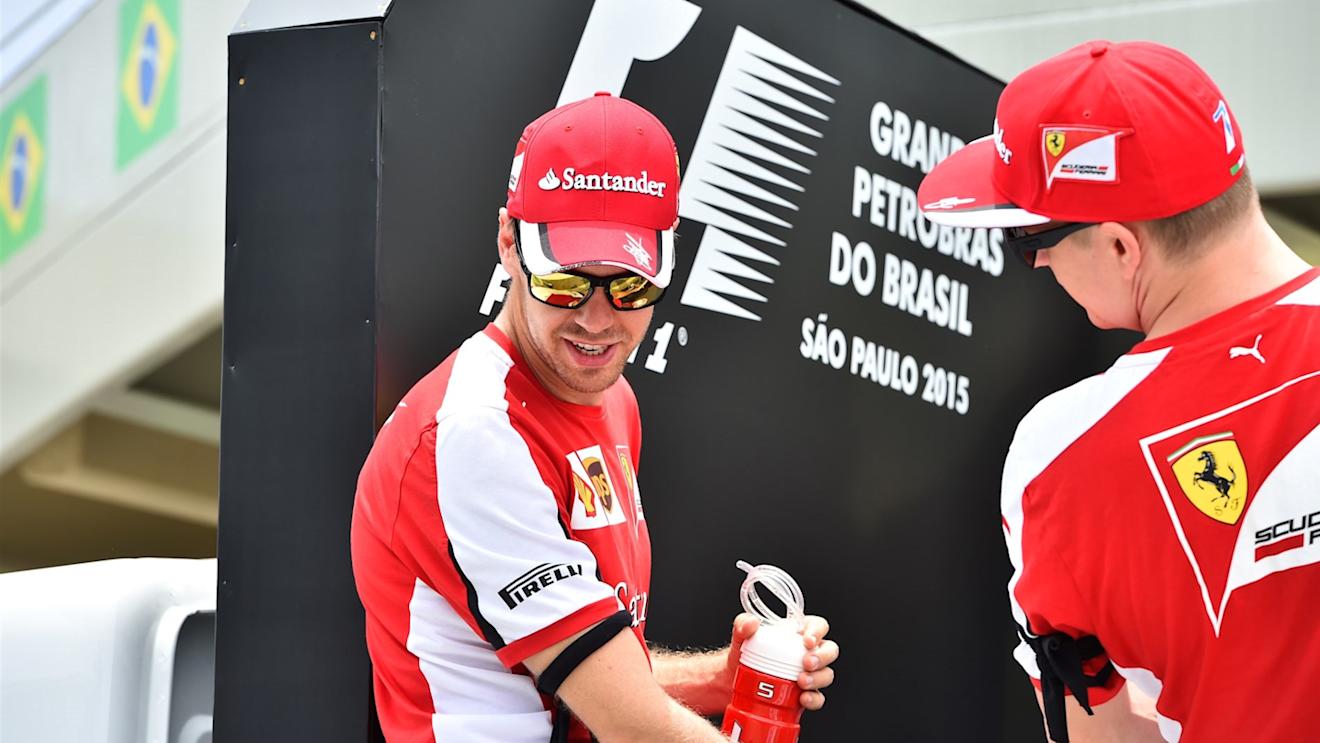 Sebastian Vettel (GER) Ferrari and Kimi Raikkonen (FIN) Ferrari on the drivers parade at Formula One World Championship, Rd18, Brazilian Grand Prix, Race, Interlagos, Sao Paulo, Brazil, Sunday 15 November 2015. © Sutton Motorsport Images