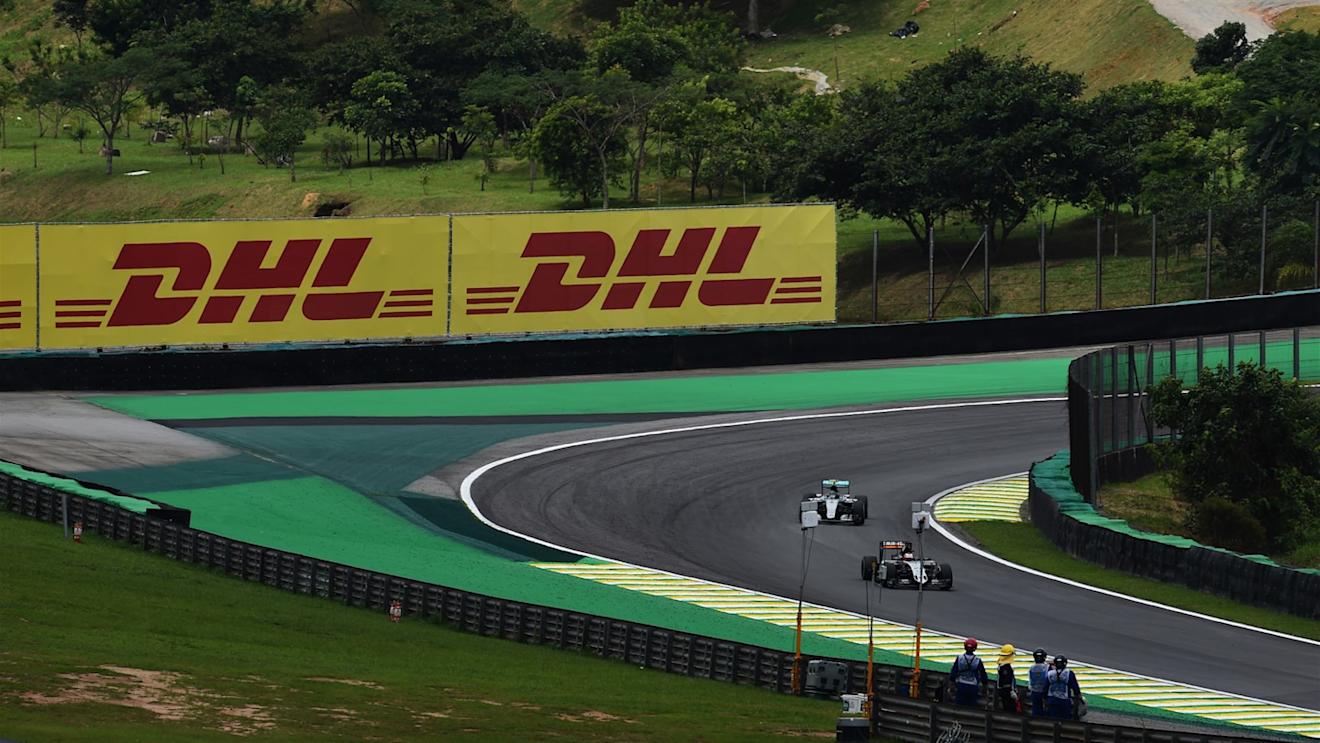 Nico Hulkenberg (GER) Force India VJM08 and Nico Rosberg (GER) Mercedes AMG F1 W06 at Formula One World Championship, Rd18, Brazilian Grand Prix, Race, Interlagos, Sao Paulo, Brazil, Sunday 15 November 2015. © Sutton Motorsport Images