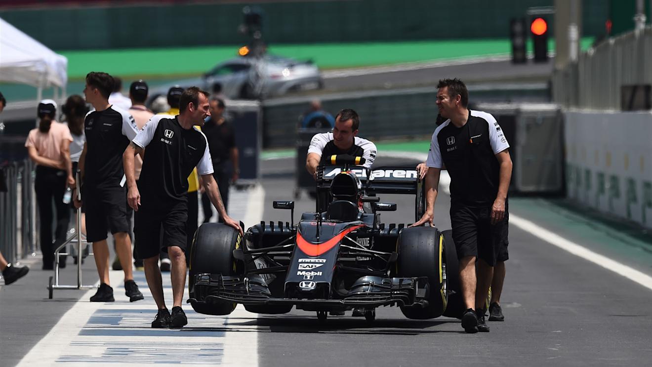 McLaren mechanics with McLaren MP4-30 in pit lane at Formula One World Championship, Rd18, Brazilian Grand Prix, Preparations, Interlagos, Sao Paulo, Brazil, Thursday 12 November 2015. © Sutton Motorsport Images