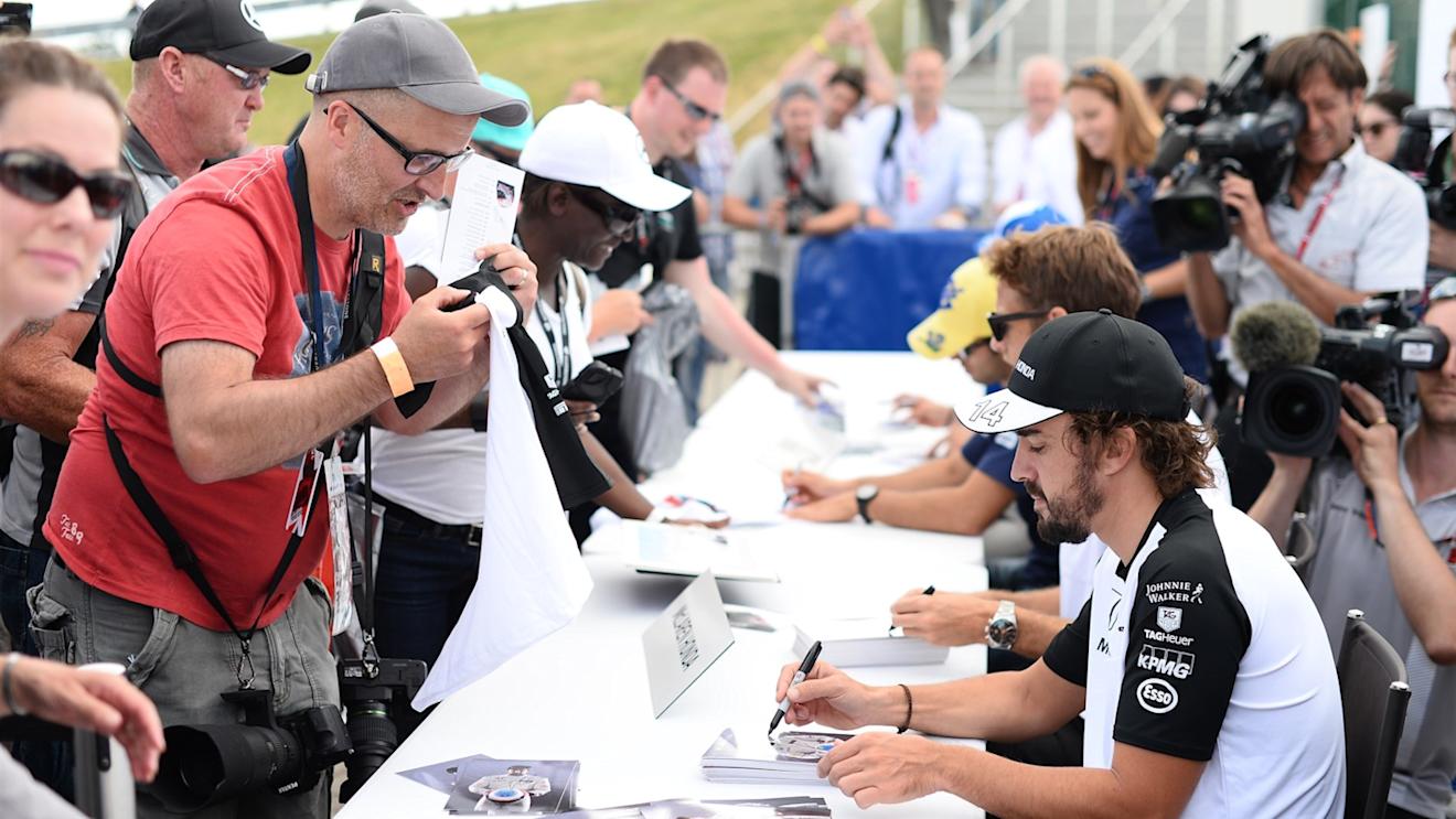 Fernando Alonso (ESP) McLaren at the drivers autograph session at Formula One World Championship, Rd9, British Grand Prix, Qualifying, Silverstone, England, Saturday 4 July 2015. © Sutton Motorsport Images