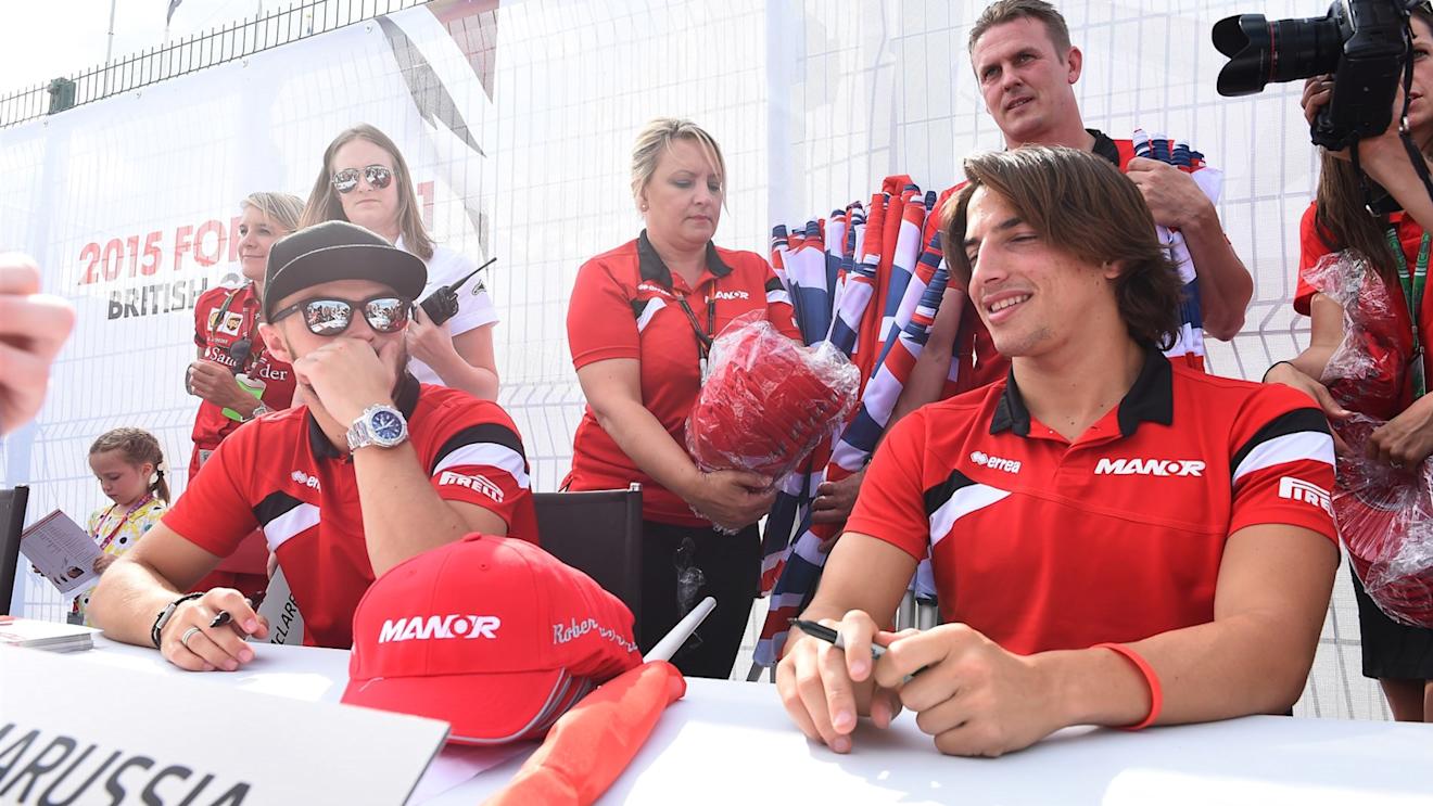 Will Stevens (GBR) Marussia and Roberto Merhi (ESP) Marussia sign autographs for the fans at Formula One World Championship, Rd9, British Grand Prix, Qualifying, Silverstone, England, Saturday 4 July 2015. © Sutton Motorsport Images