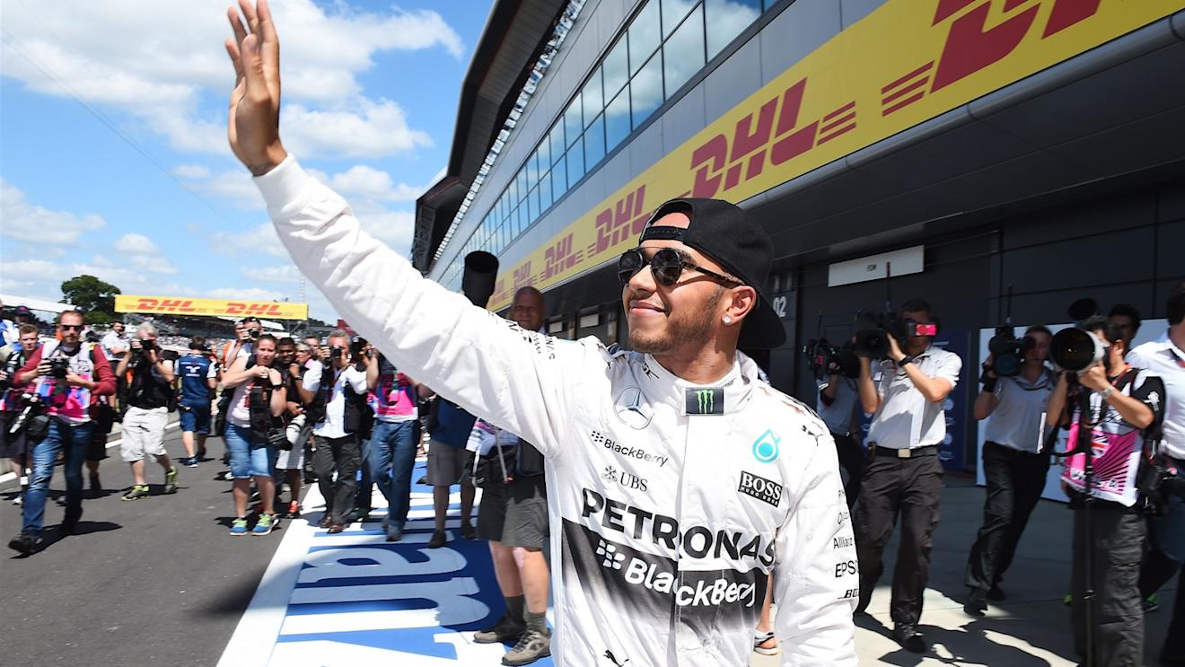 Pole sitter Lewis Hamilton (GBR) Mercedes AMG F1 celebrates in parc ferme at Formula One World Championship, Rd9, British Grand Prix, Qualifying, Silverstone, England, Saturday 4 July 2015. © Sutton Motorsport Images