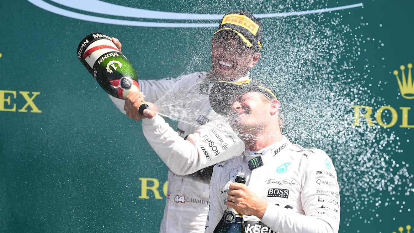 Race winner Lewis Hamilton (GBR) Mercedes AMG F1 and Nico Rosberg (GER) Mercedes AMG F1 celebrates on the podium with champagne at Formula One World Championship, Rd9, British Grand Prix, Race, Silverstone, England, Sunday 5 July 2015. © Sutton Motorsport Images