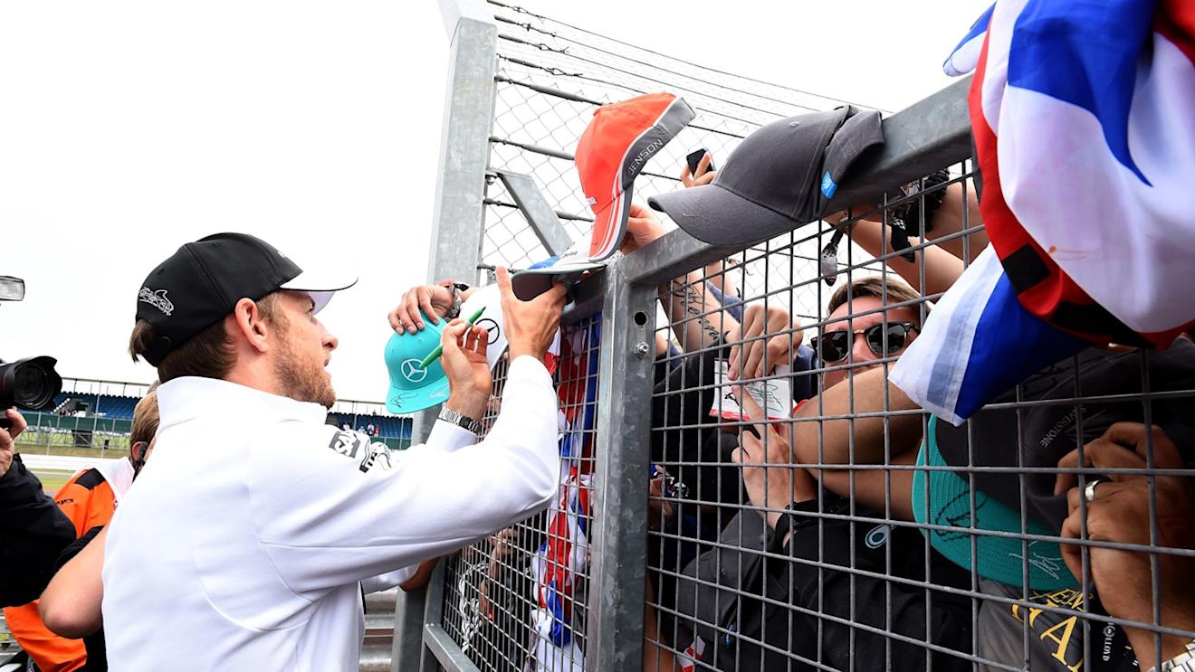 Jenson Button (GBR) McLaren signs autographs for the fans on the drivers parade at Formula One World Championship, Rd9, British Grand Prix, Race, Silverstone, England, Sunday 5 July 2015. © Sutton Motorsport Images