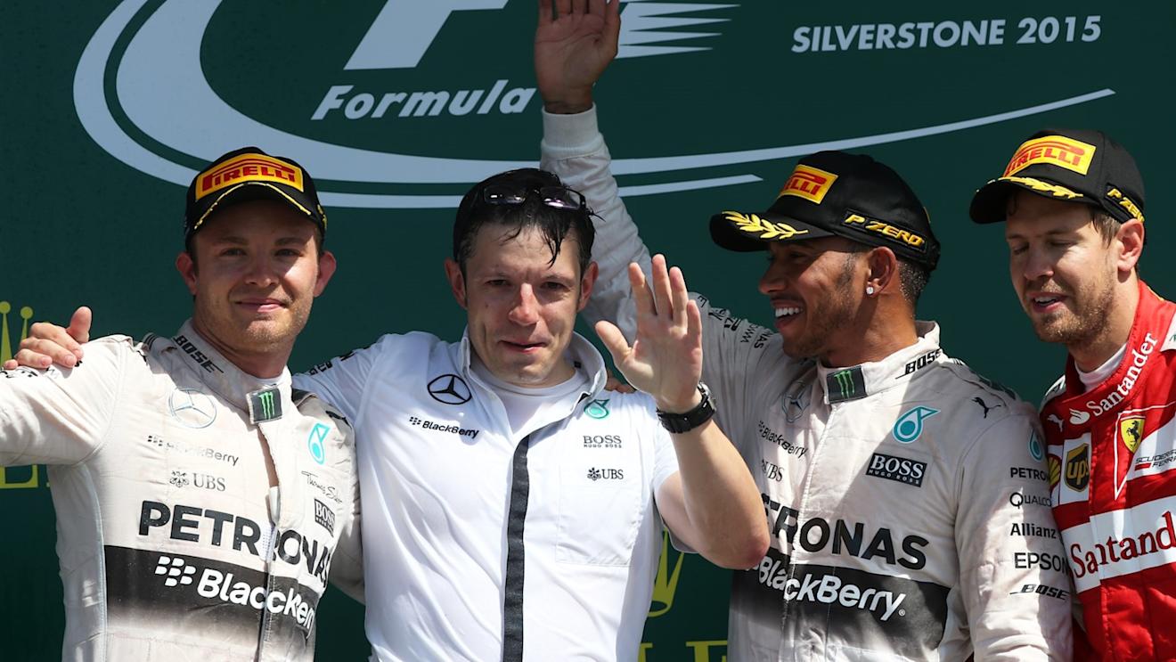 (L to R): Nico Rosberg (GER) Mercedes AMG F1, Peter Bonnington (GBR) Mercedes AMG F1 race engineer, race winner Lewis Hamilton (GBR) Mercedes AMG F1 and Sebastian Vettel (GER) Ferrari celebrate on the podium Formula One World Championship, Rd9, British Grand Prix, Race, Silverstone, England, Sunday 5 July 2015. © Sutton Motorsport Images