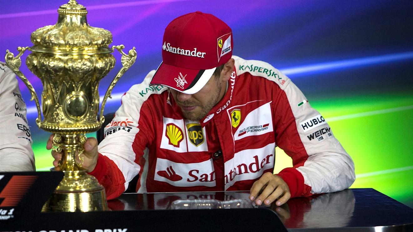 Sebastian Vettel (GER) Ferrari SF15-T in the press conference with the trophy at Formula One World Championship, Rd9, British Grand Prix, Race, Silverstone, England, Sunday 5 July 2015. © Sutton Motorsport Images