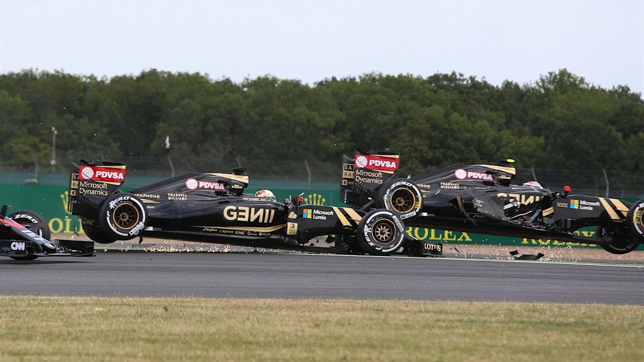 Pastor Maldonado (VEN) Lotus E23 Hybrid and Romain Grosjean (FRA) Lotus E23 Hybrid crash on lap one at Formula One World Championship, Rd9, British Grand Prix, Race, Silverstone, England, Sunday 5 July 2015. © Sutton Motorsport Images