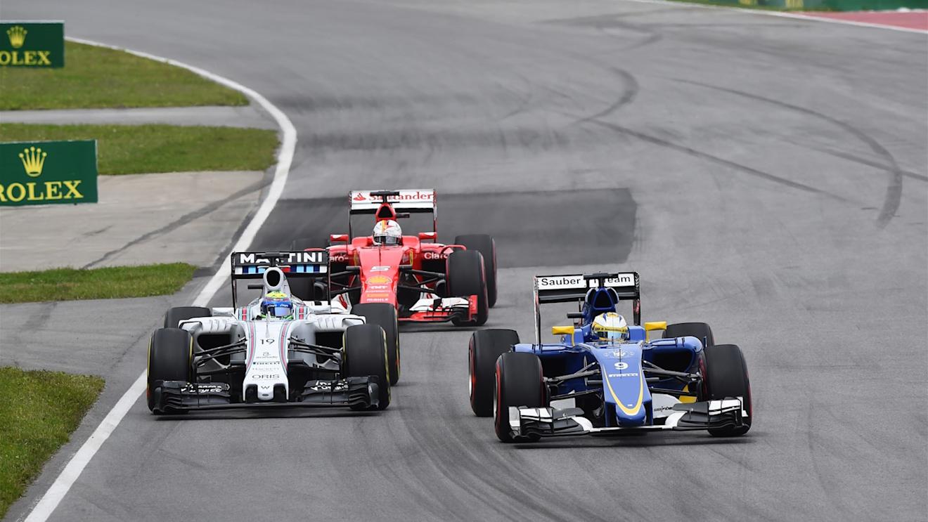 Felipe Massa (BRA) Williams FW37 and Marcus Ericsson (SWE) Sauber C34 battle at Formula One World Championship, Rd7, Canadian Grand Prix, Race, Montreal, Canada, Sunday 7 June 2015. © Sutton Motorsport Images