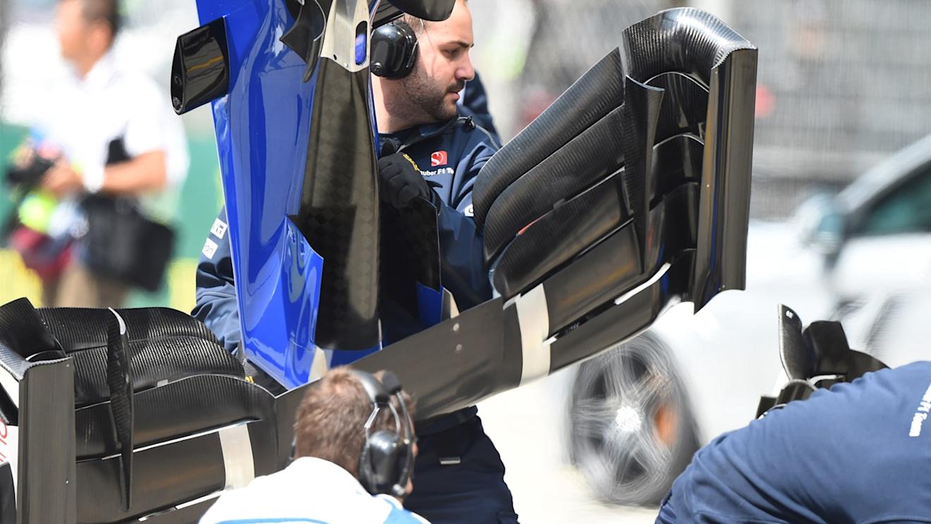 Sauber mechanic with Sauber C34 front wing at Formula One World Championship, Rd3, Chinese Grand Prix, Practice, Shanghai, China, Friday 10 April 2015. © Sutton Motorsport Images