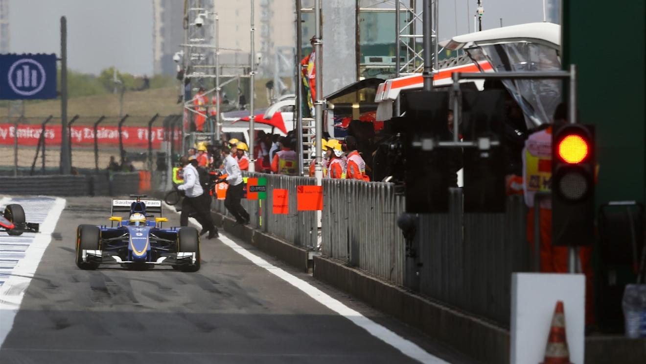 Red light at the end of the pitlane at Formula One World Championship, Rd3, Chinese Grand Prix, Practice, Shanghai, China, Friday 10 April 2015. © Sutton Motorsport Images