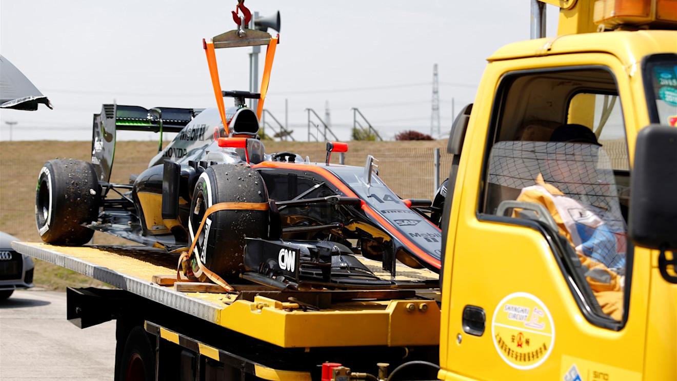 The car of Fernando Alonso (ESP) McLaren MP4-30 is recovered after stopping on track in FP3 at Formula One World Championship, Rd3, Chinese Grand Prix, Qualifying, Shanghai, China, Saturday 11 April 2015. © Sutton Motorsport Images